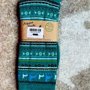 Ladies alpaca socks, brand new, with tags.Fun teal/turquoise pattern.
